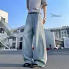 Jeans vintage lavados en azul con dobladillo curvo para hombre, estilo fino de verano, pantalones anchos de alta calle americana, marca de moda, pantalones geniales y de corte holgado