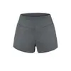 Estilo europeo diseño de cintura alta sentido del diseño panel frontal decoración versátil shorts de traje verano nuevos pierna recta ajustada pantalones cortos ajustados