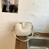 Bolso cuadrado pequeño texturizado casual de moda, nuevo bolso de hombro de nicho elegante de moda primavera 2026, bolso cruzado para mujer