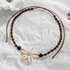 Estilo de férias boêmio flor de concha trançada corda de contas de madeira ajustável colar feminino joias atacado