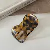 Pinza para el pelo grande marrón, nuevo modelo 2026, pinza de pico de pato para la parte trasera de la cabeza, simple y elegante, no daña la cabeza, pinza de garra para mujer
