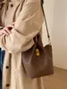 Bolso Cubo Retro de Moda para Mujer 2026 Nuevo Estilo Coreano Bolso de Mano Sencillo Bolso de Hombro con un Toque de Lujo Bolso Cruzado Versátil