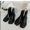 Botines Chelsea retro británicos de cuero para mujer, nuevo modelo 2026, botines elásticos de media pantorrilla, botines de pezuña de cerdo con punta dividida, botines Martin