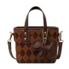 Bolso pequeño popular de este año para mujer 2024 nuevo bolso de mensajero combinable con todo diseño de nicho de alta gama bolso de cubo portátil