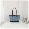 Bolso Grande de Gran Capacidad para Mujer 2026 Nueva Moda Bolso de Hombro para Viajar Sensación de Alta Gama Bolso Tote de Mezclilla