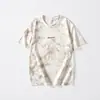 2025 Verano Nueva Marca de Moda Americana Camiseta de Manga Corta Estampada para Hombre Holgada Talla Grande Retro Camiseta de Media Manga Moderna