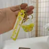 Llavero de Botella de Arena Líquida de Dibujos Animados, Pequeños Regalos para Puestos, Accesorios Acrílicos al por Mayor, Colgante Relleno de Aceite, Rasca Gatos Lindo de Regalo