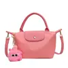 Bolsa de Nylon Fresca e Simples para Mulheres 2025 Nova Moda Versátil Bolsa Transversal Texturizada Bolsa de Ombro Venda por Atacado