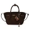 Bolso de mano único para mujer 2026 verano nuevo vintage de alto valor para el trabajo bandolera elegante bolso cubo cruzado