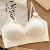 Sujetador térmico fino para mujer, sin aros, con escote en V de encaje, sensación de segunda piel, algodón cepillado, con características de realce y anti-caída, y hermoso diseño de espalda