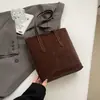 Bolsas da Moda Deste Ano 2026 Novo Estilo de Verão Bolsas de Ombro de Nicho Versáteis Estilosas Bolsas Transversais Tipo Balde