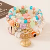 Bestseller transfronteiriço Pulseira com pingente de grão de café olho grego estilo boêmio, pulseira de cordão elástico multicamadas com contas