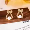 Pendientes de Botón con Lazo y Perlas, Moda Estilo Coreano, Pendientes de Diseño Dulce y Lujo Ligero, Pendientes Pequeños, Exquisitos y Versátiles