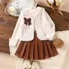 Traje Infantil Europeo y Americano Amazon Milagro Nuevo Chaleco Color Albaricoque Camiseta Interior de Manga Larga Falda Blanca Conjunto de Tres Piezas
