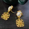 Clip de Oreja Exagerado Hueco de Cabeza de León Antiguo Moda para Mujer Pendientes de Perla de Lujo Ligero Estilo Palacio Venta al por Mayor Transfronteriza