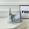 Moderna y versátil nueva colección 2026 de bolsos de axila de nicho para mujer, elegantes bolsos de hombro para mujer, bolsos cruzados de hombro de nicho para mujer