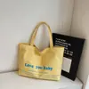 Bolsas de Lona Tendência deste Ano para Mulheres, Grande Capacidade, Novo Estilo 2026, Bolsas de Lona Estampadas com Letras, Bolsas Tote Personalizadas Super Populares