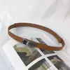 Directo de fábrica lote hebilla elástica ajustable de doble cara cinturón fino para mujer cinturón Kelly vestido todo-partido verano nuevo
