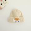 Chapéu de Lã Tricotado Quente de Inverno Unisex Baoqiu Etiqueta de Urso Fofo Super Fofo Capuz com Proteção para Orelhas Vento ao Ar Livre Tendência