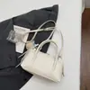 2026 Bolsa de Mão Boston Brilhante Bolsa Pequena Urso com Laço Alça Transversal Ajustável Estilo Suave Bolsa Almofada Feminina