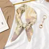 Novo Headdress da Coreia do Sul de Primavera Lenço de seda longo estilo retrô francês Fita Acessórios de cabelo versáteis femininos Fita de amarrar Faixa de cabelo personalizada