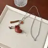 Colgante de Bolsa de Cuero con Corazón Incrustado de Diamantes Collar Largo para Mujer Diseño de Nicho Moda Versátil Cadena para Suéter