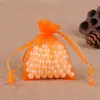 Bolsa de hilo para joyería al por mayor de fábrica color liso hilo de perla bolsa para dulces de boda empaque de joyería color liso bolsa de malla de gasa organza