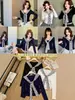 Chal Rayado Estilo Coreano Camiseta de Manga Larga para Mujer 2026 Nuevo Diseño de Falso Dos Piezas Sentido del Diseño Top Adelgazante para el Trabajo