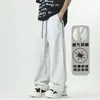 Pantalones casuales nuevos de primavera y verano para hombres y mujeres, pantalones de pierna ancha holgados de color liso con cremallera, diseño de malla a rayas, pantalones largos de estilo callejero