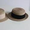 Sombrero de paja tejido de ala plana estilo francés para mujer, estilo vacacional de verano, sombrero de protección solar para la playa, sombrero de sol de alta gama