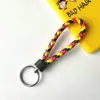 Llavero creativo de cuerda de cuero tejido a mano para pareja, llavero de coche, llavero al por mayor, colgante para bolso