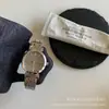IEKE Gran Venta Gris Elegante Disco Banda de Acero Reloj para Mujer Viajero Lujo Ligero Simple Estilo Frío Reloj de Mujer de Gama Alta