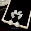 Pendientes de Borlas Geométricas de Diseño de Nicho Novedad Otoño 2026 Pendientes de Lujo Ligero de Gama Alta Pendientes de Perlas y Circonitas para Mujer