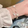 Pulsera de Perlas Mariposa Azul Menta para Mujer, Moderna y de Alta Gama, Joyería de Mano Dulce y Delicada, Accesorio Fresco y Versátil de Verano