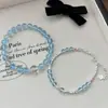 Pulsera de cristal de imitación aguamarina azul claro pulsera de cuentas de vidrio diseño de nicho sentido del diseño regalo accesorio de mano versátil para mujeres exquisito