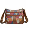 Bolso de mujer multicapa 2026 nuevo modelo bolso pequeño de cuero suave bolso de hombro para mujer bolso cruzado de moda versátil bolso grande para mamá