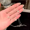 Collar de corazón de doble capa estilo francés para celebridades de internet para mujer, cadena de clavícula de alta gama, accesorio de cuello súper elegante 2026