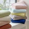 Sábana de cama de gasa de doble capa Clase A de una sola pieza, gorro de cama, funda de edredón de algodón puro 200x 230 individual y doble funda de edredón de color sólido