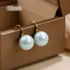 Tacones Altos Azul Humo Aretes de Perlas para Mujer, Temperamento de Lujo Ligero, Moda de Nicho, Ganchos para Orejas de Perla Aurora Azul Claro