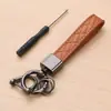 Llavero de coche directo de fábrica para mujer colgante exquisito personalidad hombre colgante de alta gama anillo de llavero de pareja
