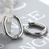 Venta al por mayor de fábrica nuevo hebilla de oreja redonda de acero de titanio simple innovación nicho ISS Oval pendientes de acero inoxidable para mujer