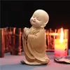 Pequeno sofá reclinável Maitreya ornamentos de lazer armário de TV doméstico decorações interessantes chinesas artesanato de resina fabricantes atacado