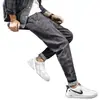 Calça Jeans Masculina Slim Fit Perna Afunilada Primavera e Outono Juventude Versátil Elástica Tendência Marca Casual Calça Comprida Masculina Estilo Coreano Tendência