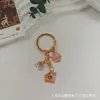 Chaveiro de Ovo de Páscoa Desenho Animado Transfronteiriço Coelho Fofo Pingente de Liga Metálica com Gotejamento de Óleo para Mochila Escolar Ornamentos Pendurados de Presente Exquisitos