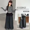 Pantalones de cuadros para niña de otoño 2026 nuevo estilo pantalones cargo para niños con solapa trasera, pantalones tipo linterna casuales de principios de otoño a la moda para niños mayores