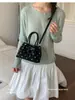 Nueva bolsa de axila de lunares 2026 verano nuevo bolso de mano moda casual bolso pequeño bolsa de albóndiga