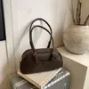 Bolsa de Axila Texturizada Niche Retrô para Mulheres 2025 Nova Bolsa Simples de Bowling Outono e Inverno Bolsa de Ombro de Grande Capacidade