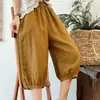 Pantalones tipo linterna casuales de algodón y lino de verano para mujer, shorts holgados de color liso simples y versátiles, pantalones harén retro de cinco puntos talla grande