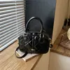 Bolsa bordada de nicho super popular para mulheres, nova bolsa transversal versátil da moda 2026, bolsa de mão requintada, bolsa almofada, bolsa quadrada pequena