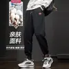 Pantalones de Chándal Forrados de Polar para Hombre Otoño Invierno Marca Americana de Moda Cordón Pantalones Largos Deportivos Sueltos Versátiles para Hombre Puño Casual